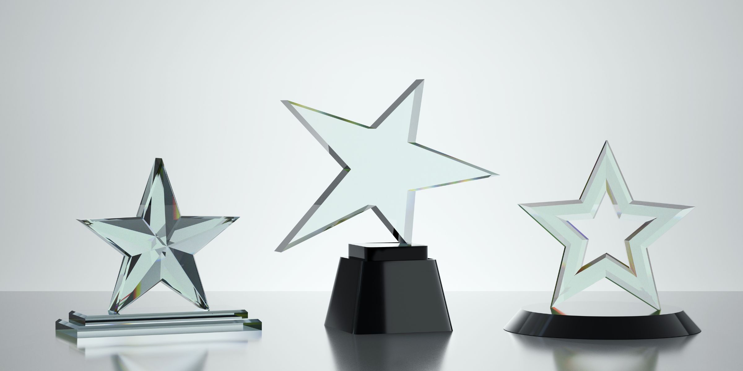three star shaped trophies