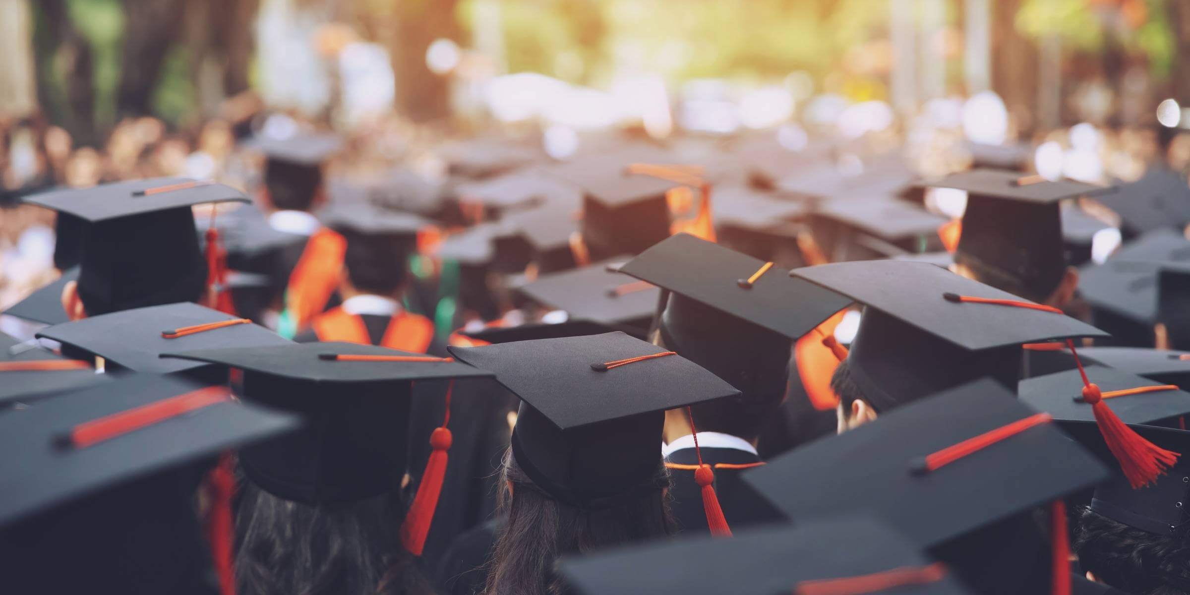 students wearing graduation caps