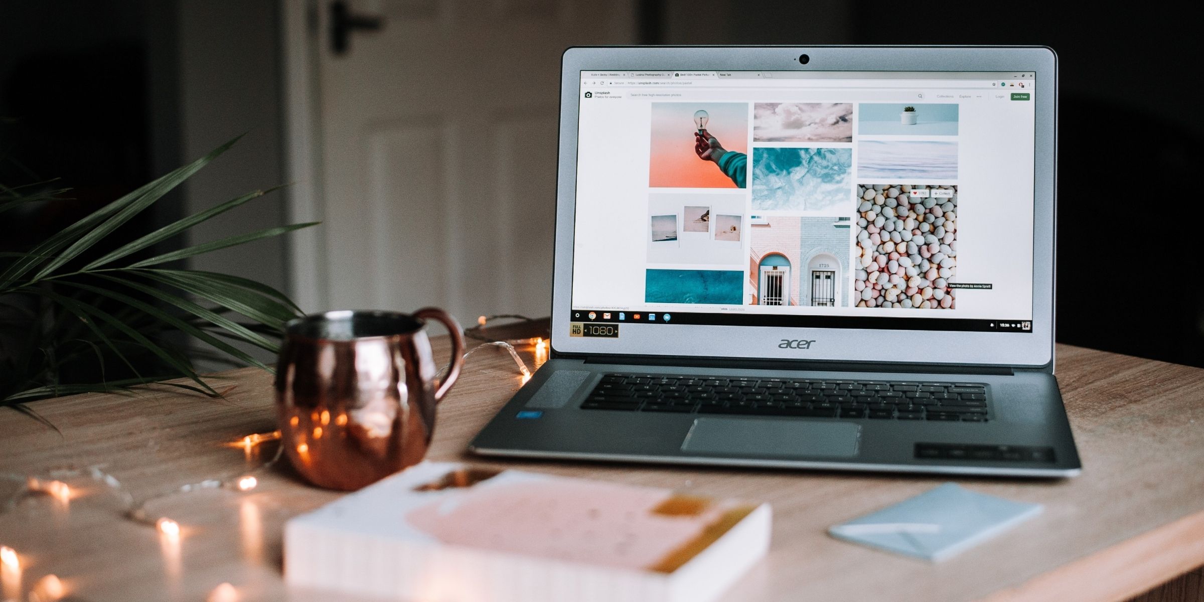 an open laptop with scenic photos displayed on its browser