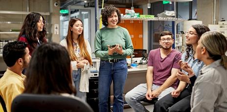 a group of students chatting in a circle