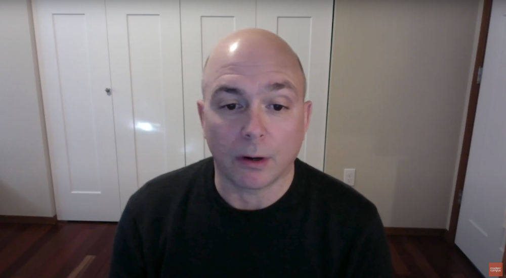 screenshot of Shawn Devine speaking—a preview of the video