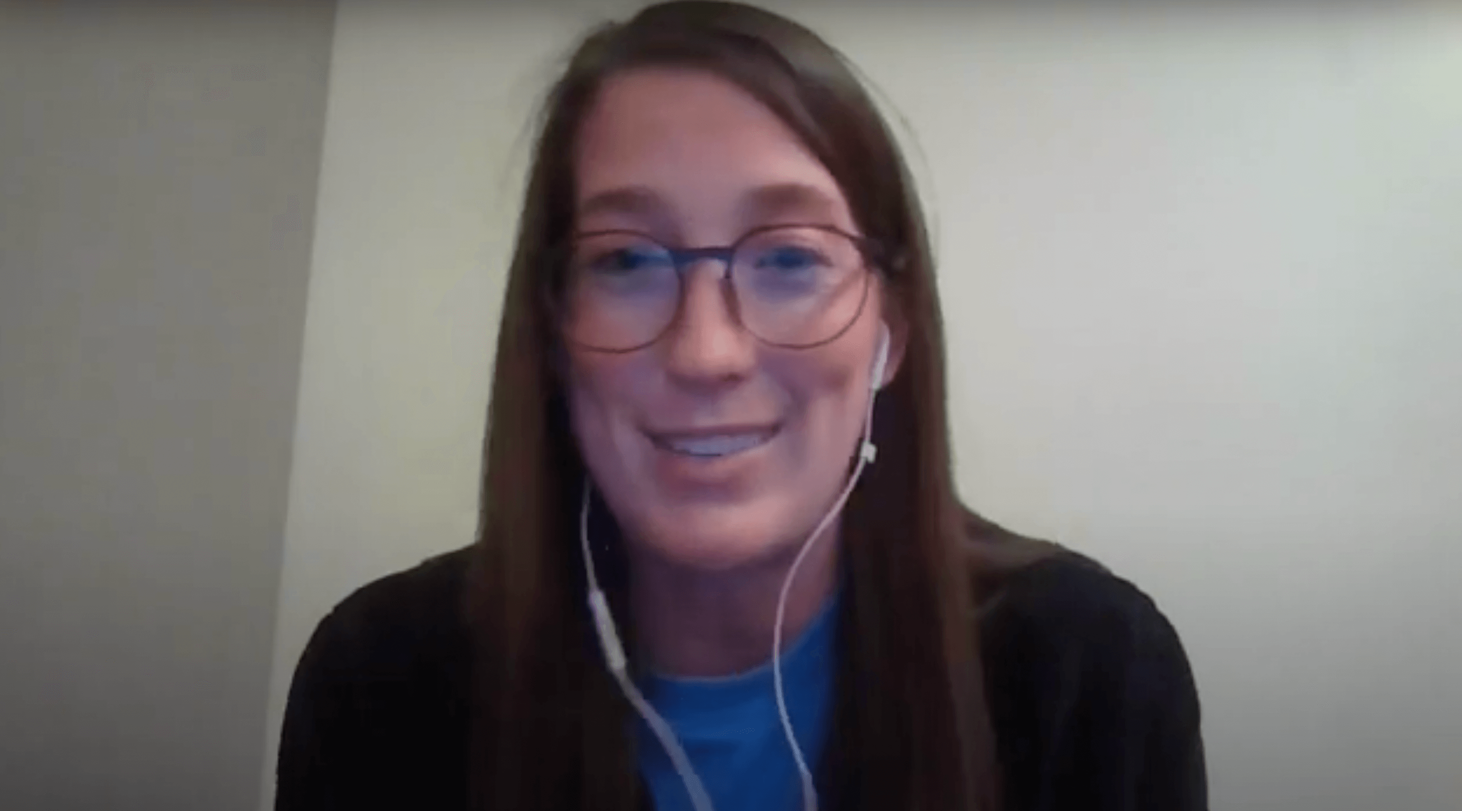 preview of Sydney Kuhn smiling at the camera as she speaks within the video