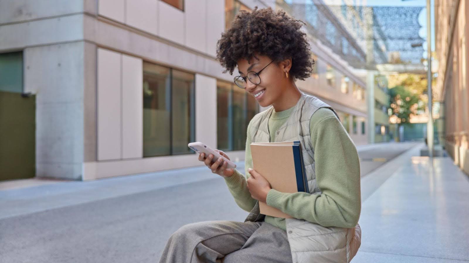 woman-student-on-phone-on-campus